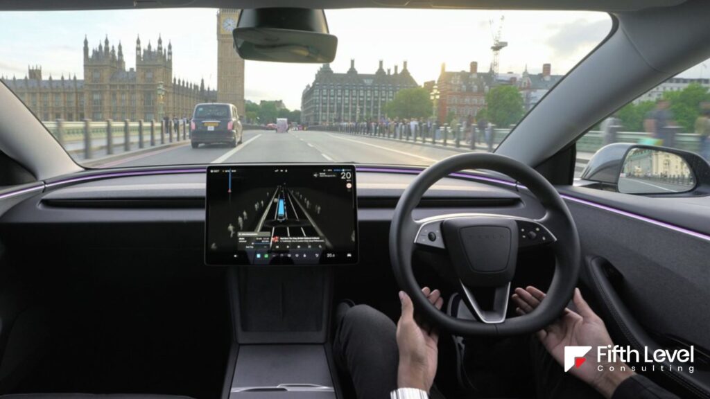 A white male driver seated behind the steering wheel as the Tesla FSD (Supervised) is activated.