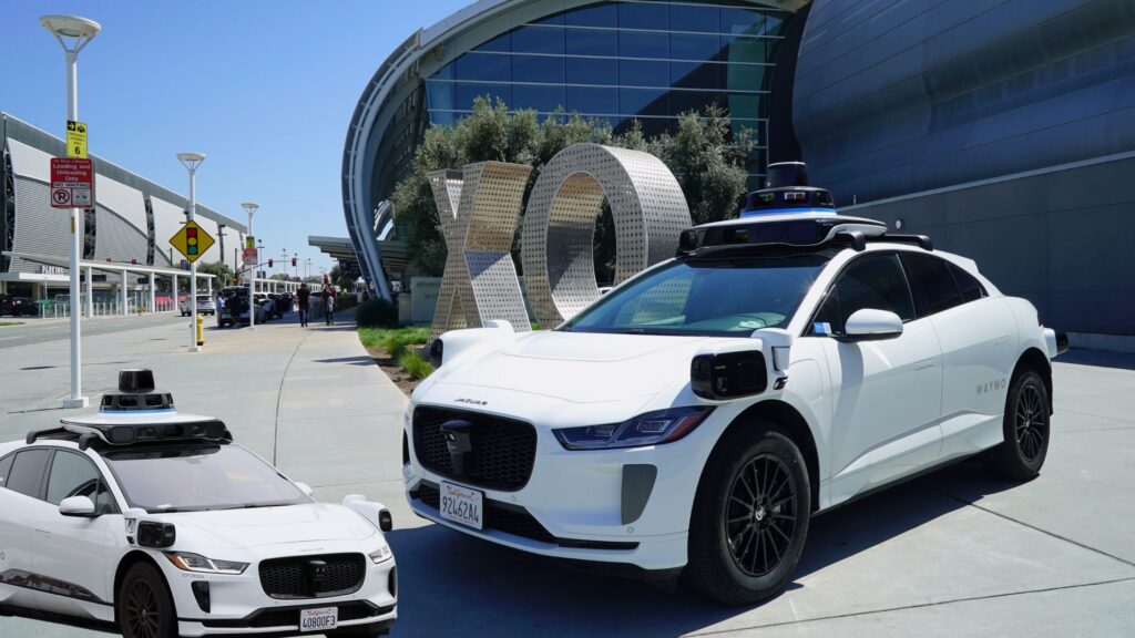 A Waymo robotaxi parked outside the San Jose Mineta airport.