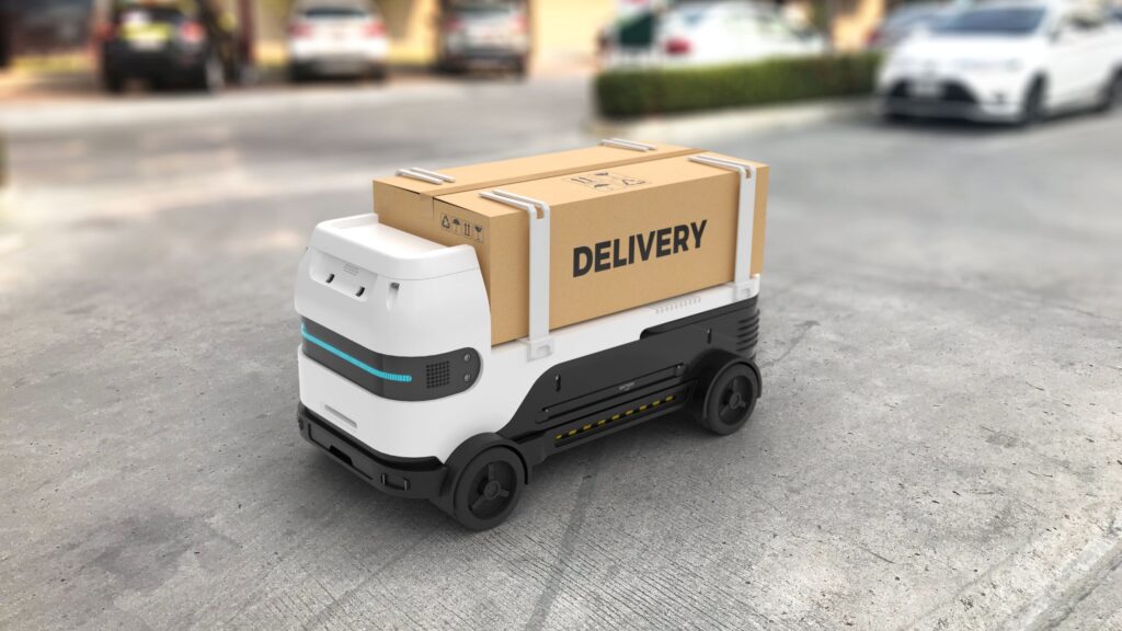 A self-driving robot loaded with consignments in a warehouse.