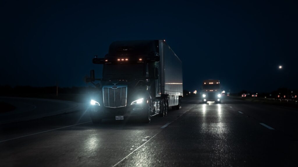 Aurora self-driving truck driving at night in Texas.