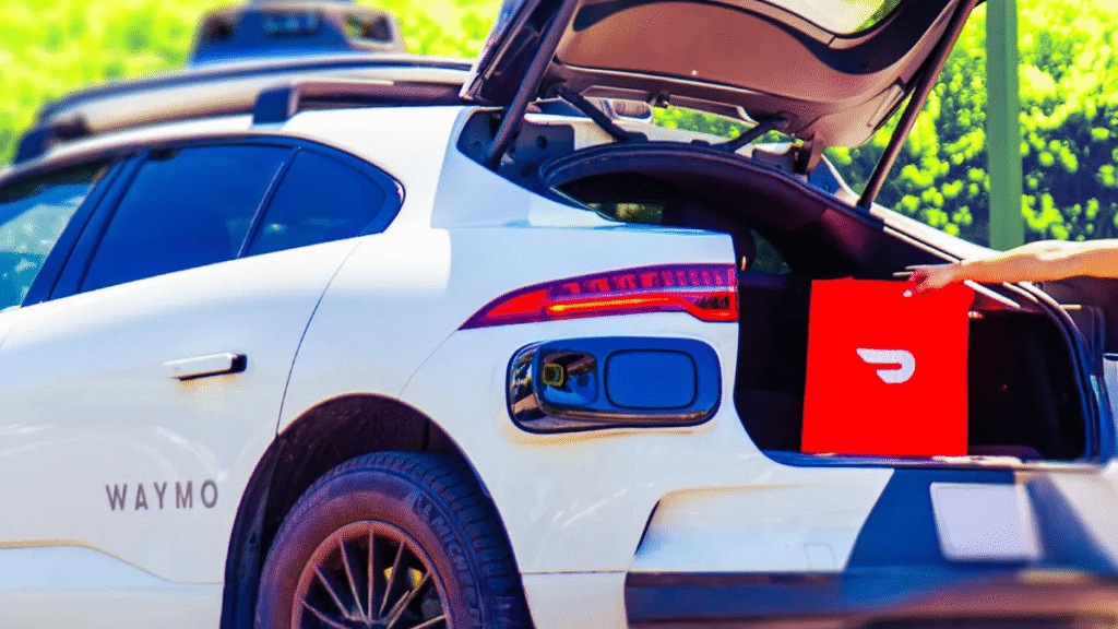 A customer is removing a DoorDash order from the trunk of a Waymo vehicle.