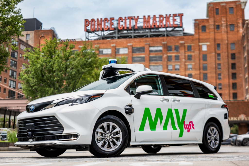 A May Mobility Toyota Minivan with a Lyft branding