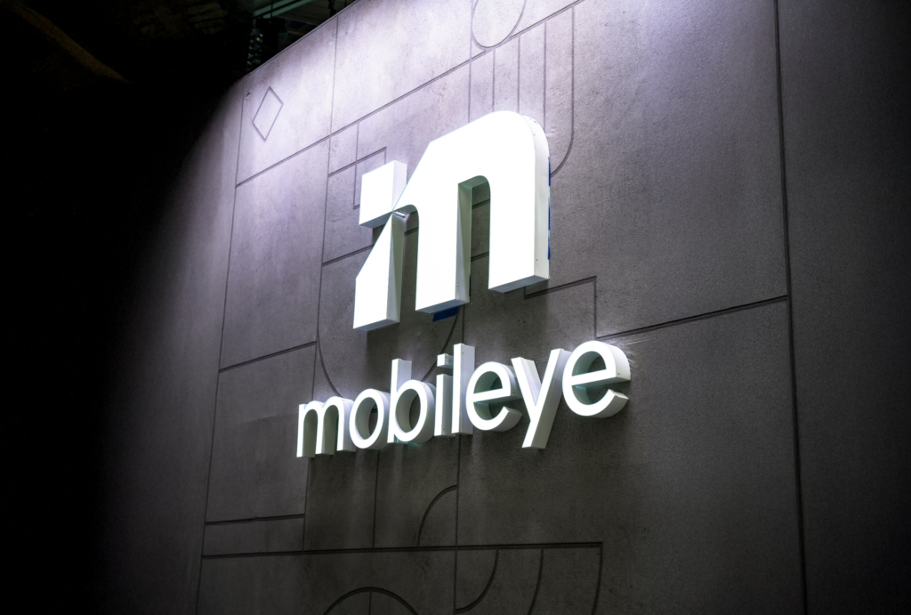 The Mobileeye logo against a 3D background