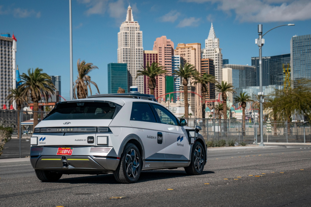 A Motional Hyundai Ioniq 5 driverless car with Uber branding